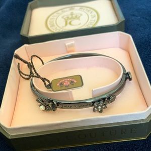 Juicy Couture dark bangle with decorative faux pearl, floral, diamonds